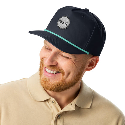 Navy Blue & Teal 5-panel Course Correction Rope Golf Hat with semi-curved bill and snapback closure; crude oil golf hat worn by smiling man